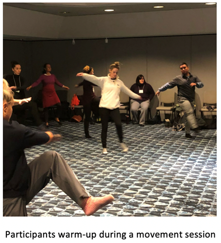Participants warming up during a movement session