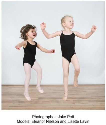 Two child dancers jumping